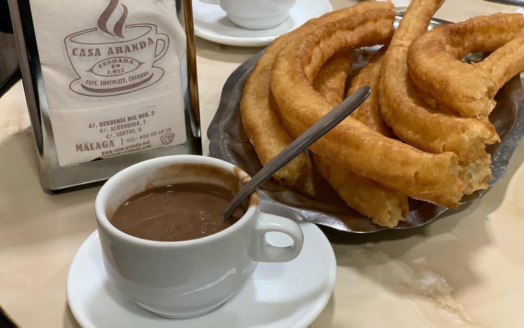 Visita Belenes, chocolate con churros y luces calle Larios